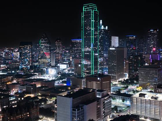 Dallas towers lit against the night.