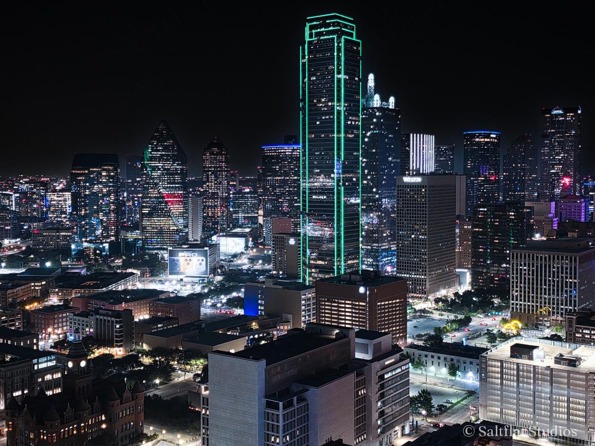 Dallas towers lit against the night.